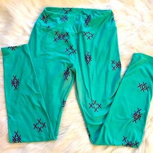 Teal with purple exes Lula row leggings one size